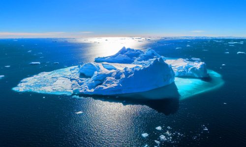 Towering over the Eiffel Tower, the world’s largest iceberg breaks free and roams the seas